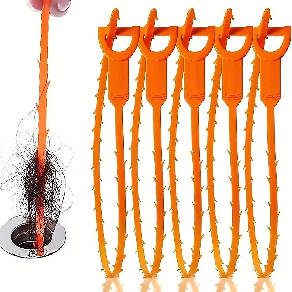5 avløpsrensere i oransje plast med små mothaker
