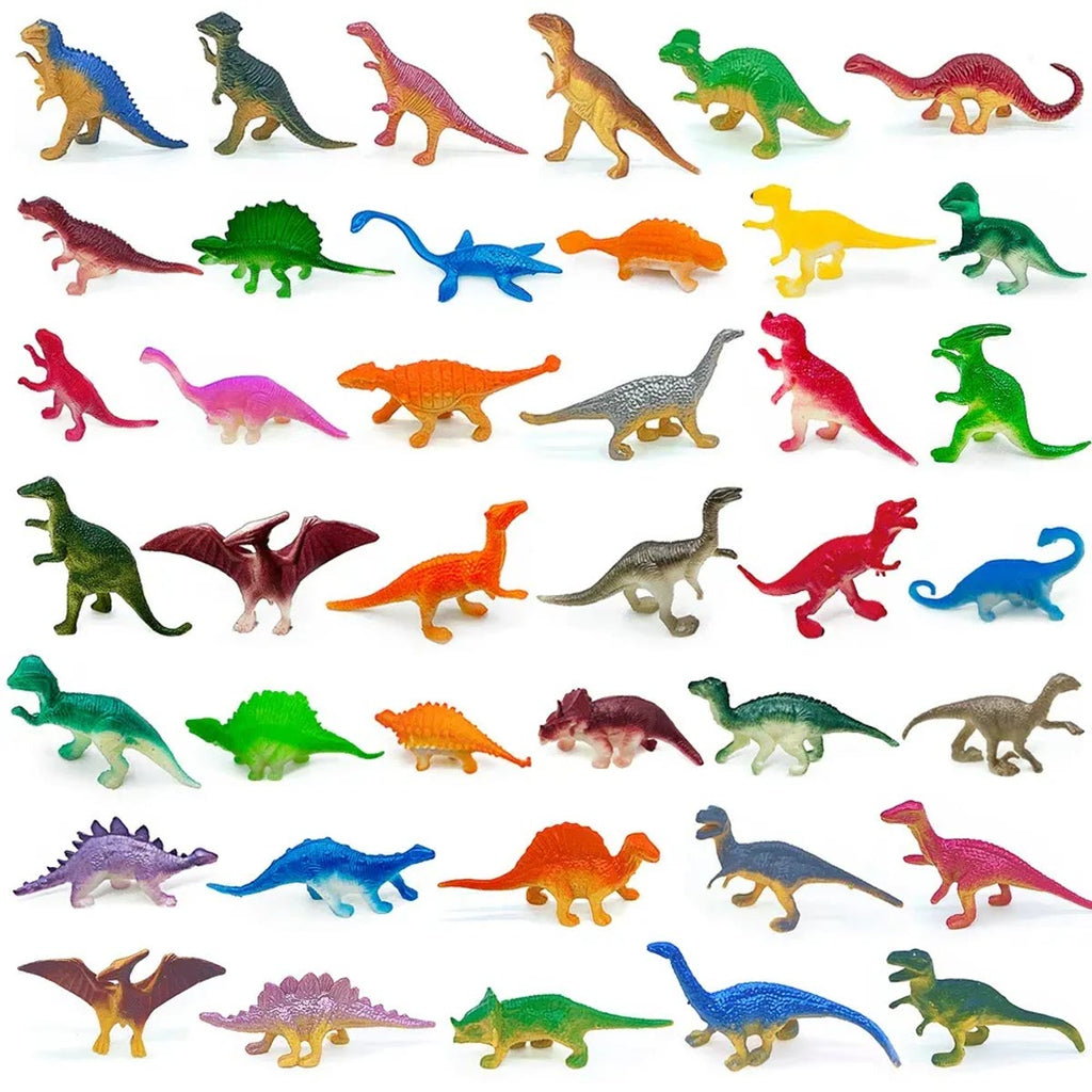 Et utvalg av dinosaurfigurene lagt ut i rader på hvit bakgrunn, i mange farger og former