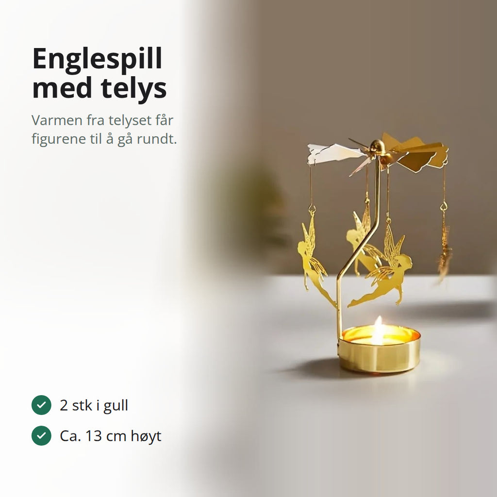 Englespill i gull med fire engler under propellen og et tent telys i koppen