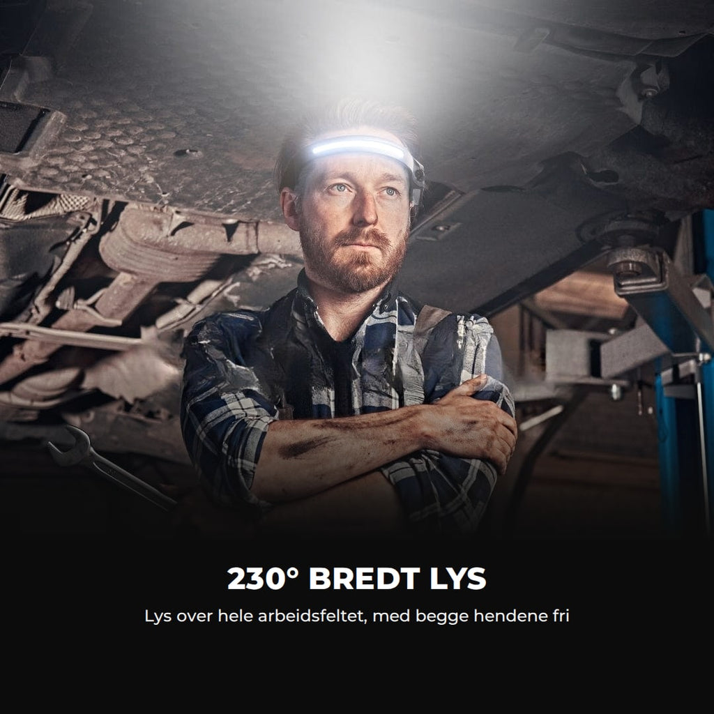 Mann under en bil med hodelykten tent: 230° bredt lys, med begge hendene fri