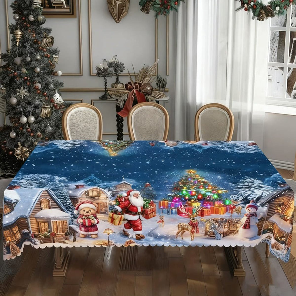 Juleduk med vinterlandskap i blått på et bord med juletre i bakgrunnen