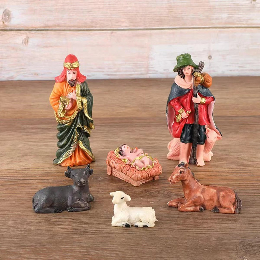 En vismann, gjeteren, krybben med Jesusbarnet og dyrene fra julekrybben