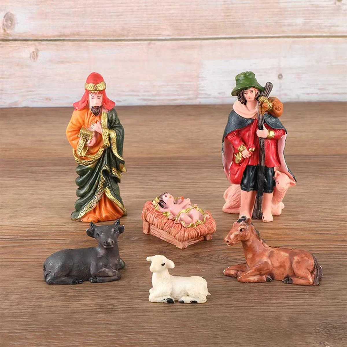 En vismann, gjeteren, krybben med Jesusbarnet og dyrene fra julekrybben