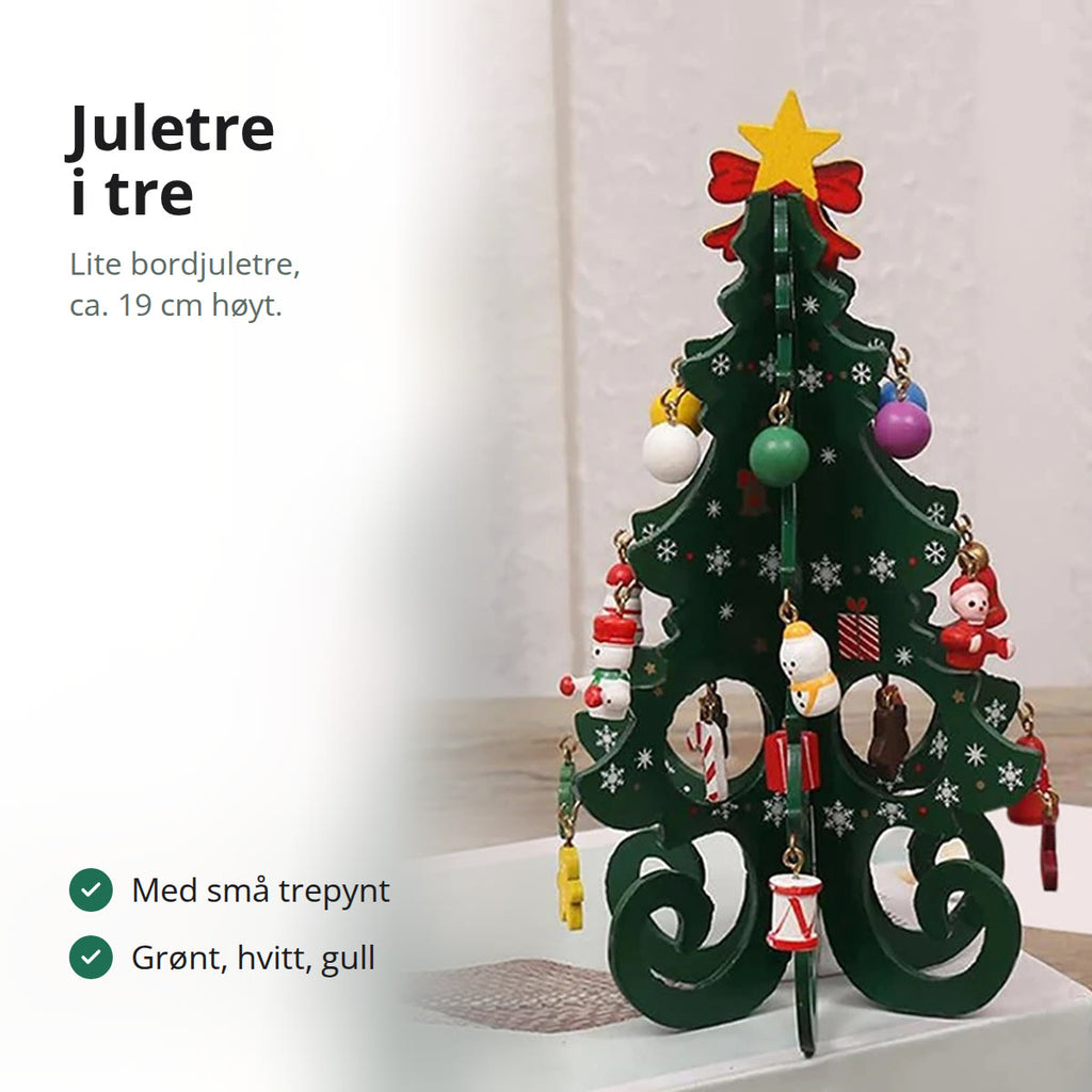 Grønt juletre i tre med stjerne, sløyfe og små trepynt