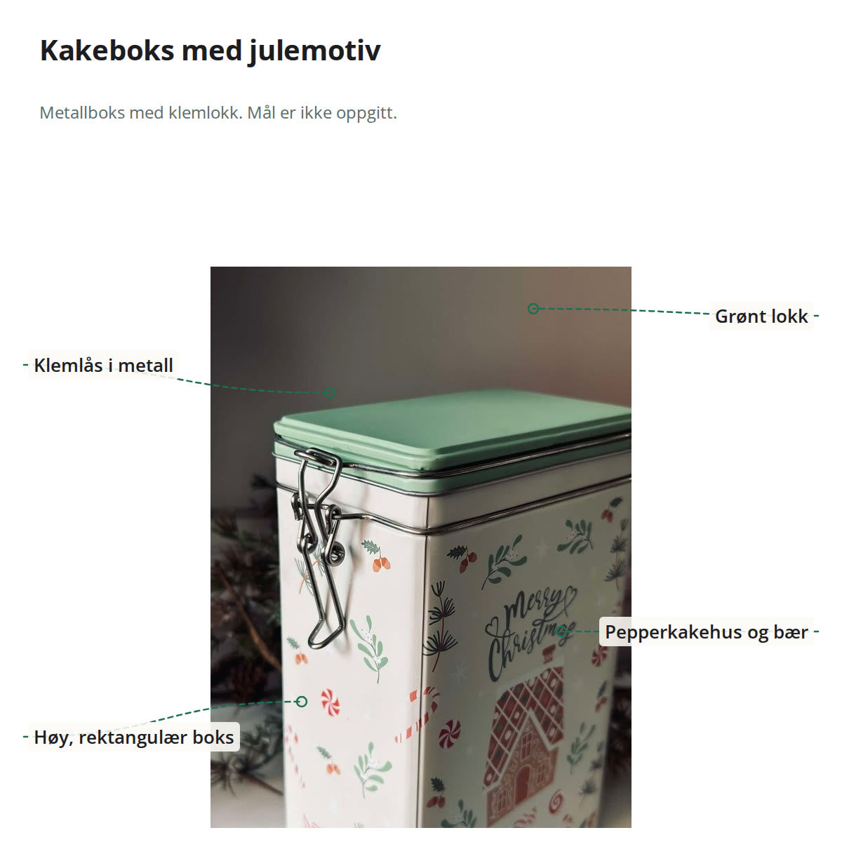 Kakeboksen merket med klemlås i metall, grønt lokk, pepperkakehus og bær, og høy rektangulær form
