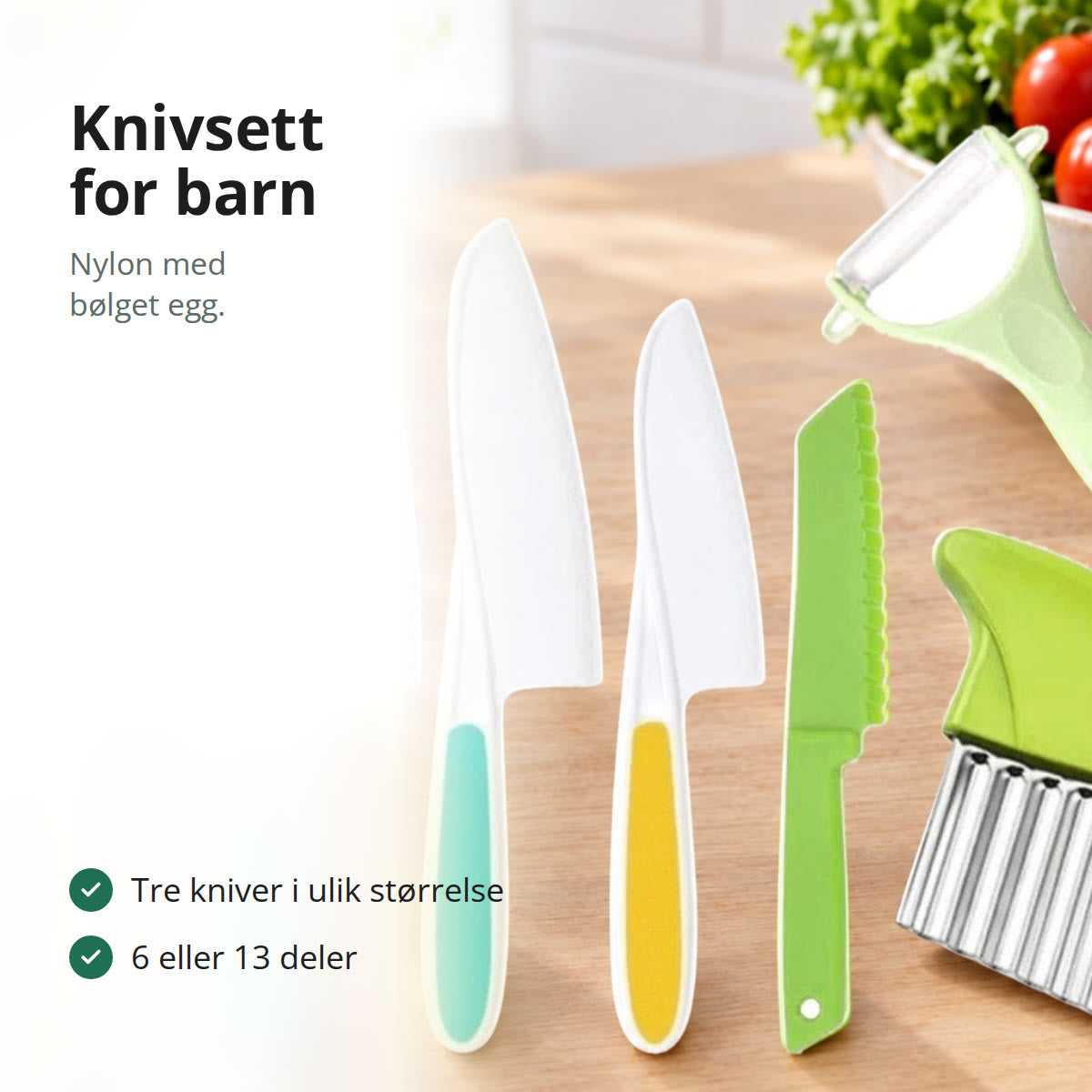 Knivsett for barn med nylonkniver og skreller på en kjøkkenbenk