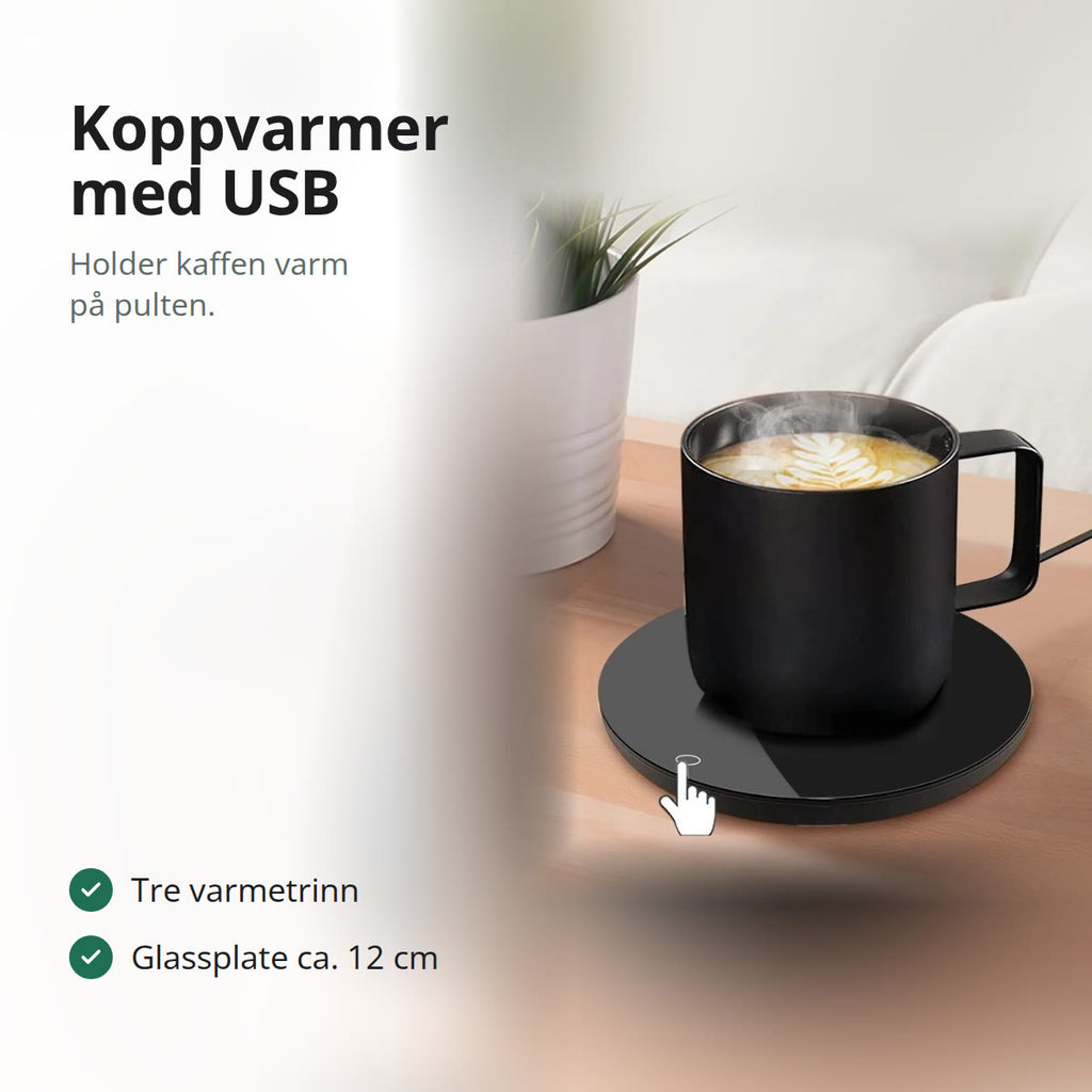 Svart koppvarmer med USB under et krus med kaffe på et bord