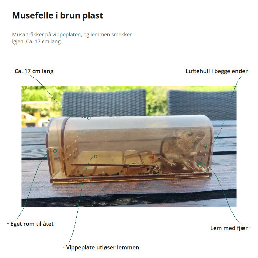Musefella merket med eget rom til åtet, vippeplate, lem med fjær, luftehull i begge ender og lengde på ca. 17 cm