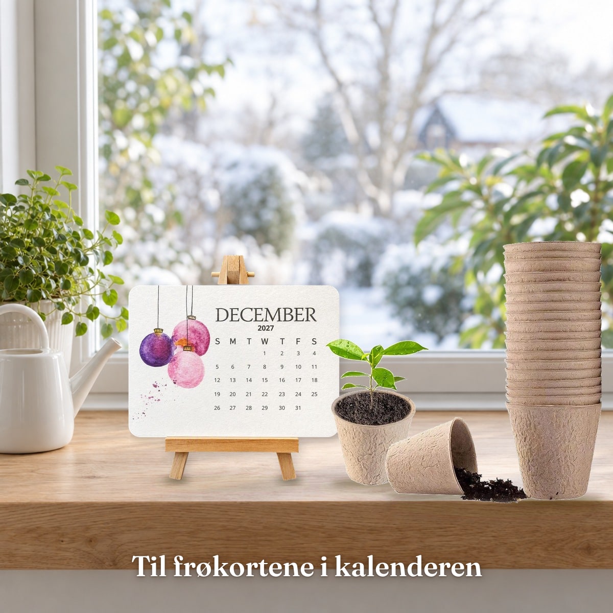 Frøkalenderen på stativ ved siden av plantepottene i vinduskarmen