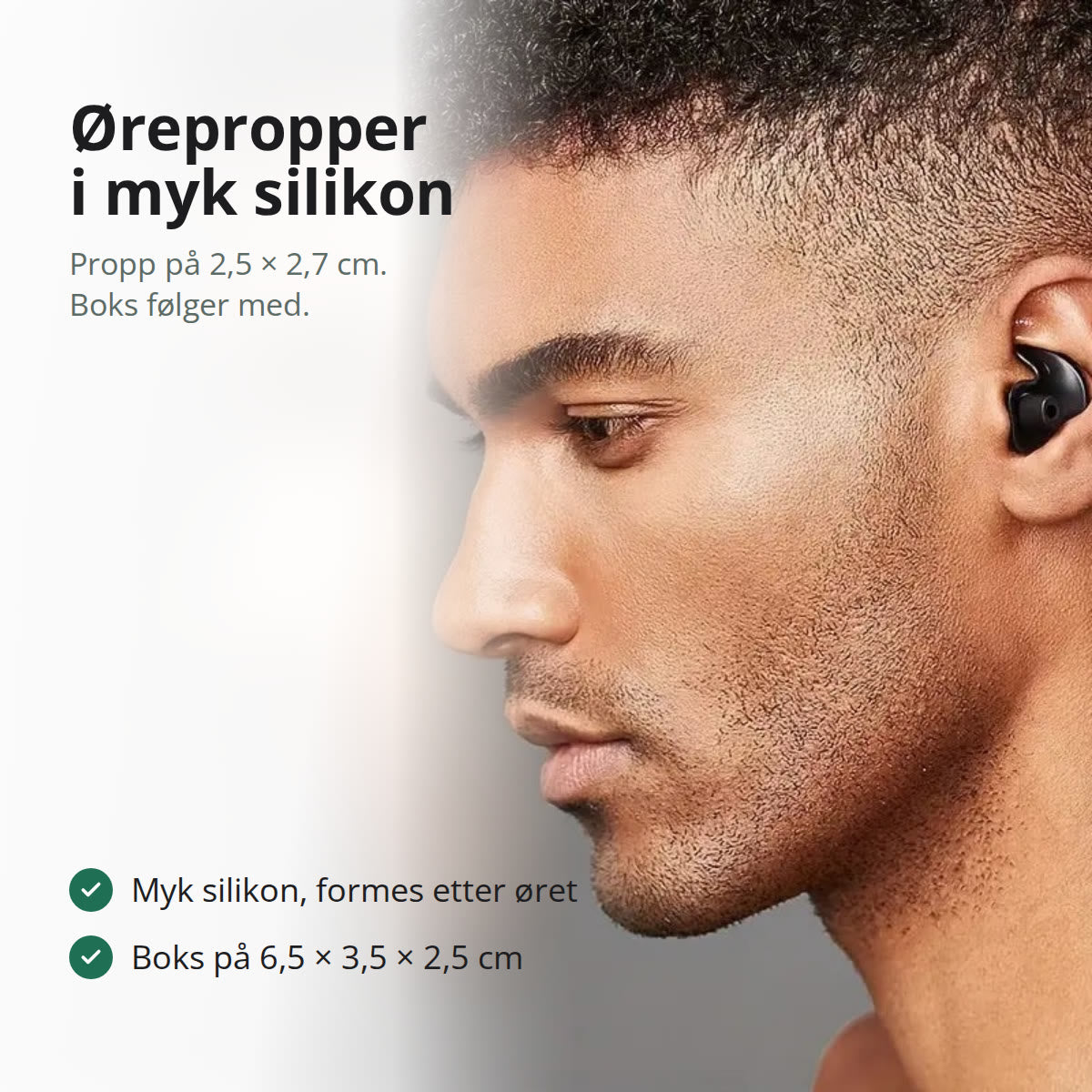 Sorte silikonørepropper som ligger i åpne oppbevaringsbokser på et nattbord i eik