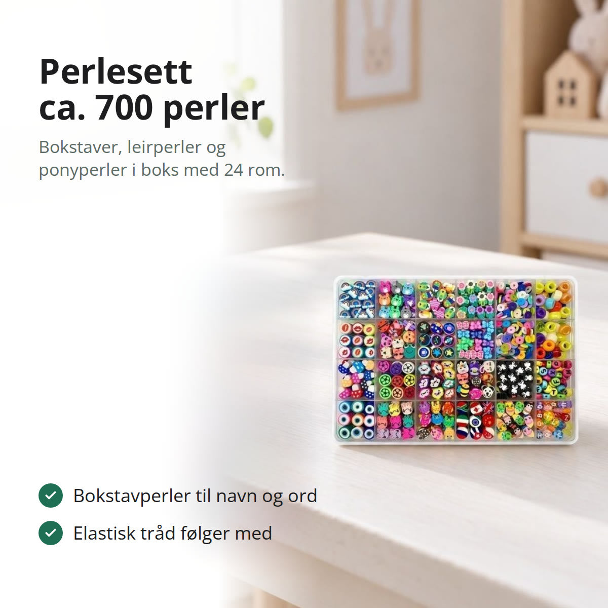 Perlesett i sorteringsboks med 24 rom med leirperler, bokstavperler og ponyperler, på en hvit pult i et barnerom