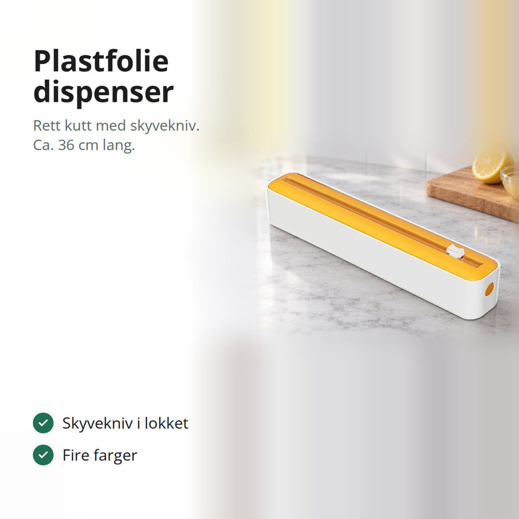 Plastfolie dispenser med gult lokk og skyvekniv på en marmorbenk i et lyst kjøkken