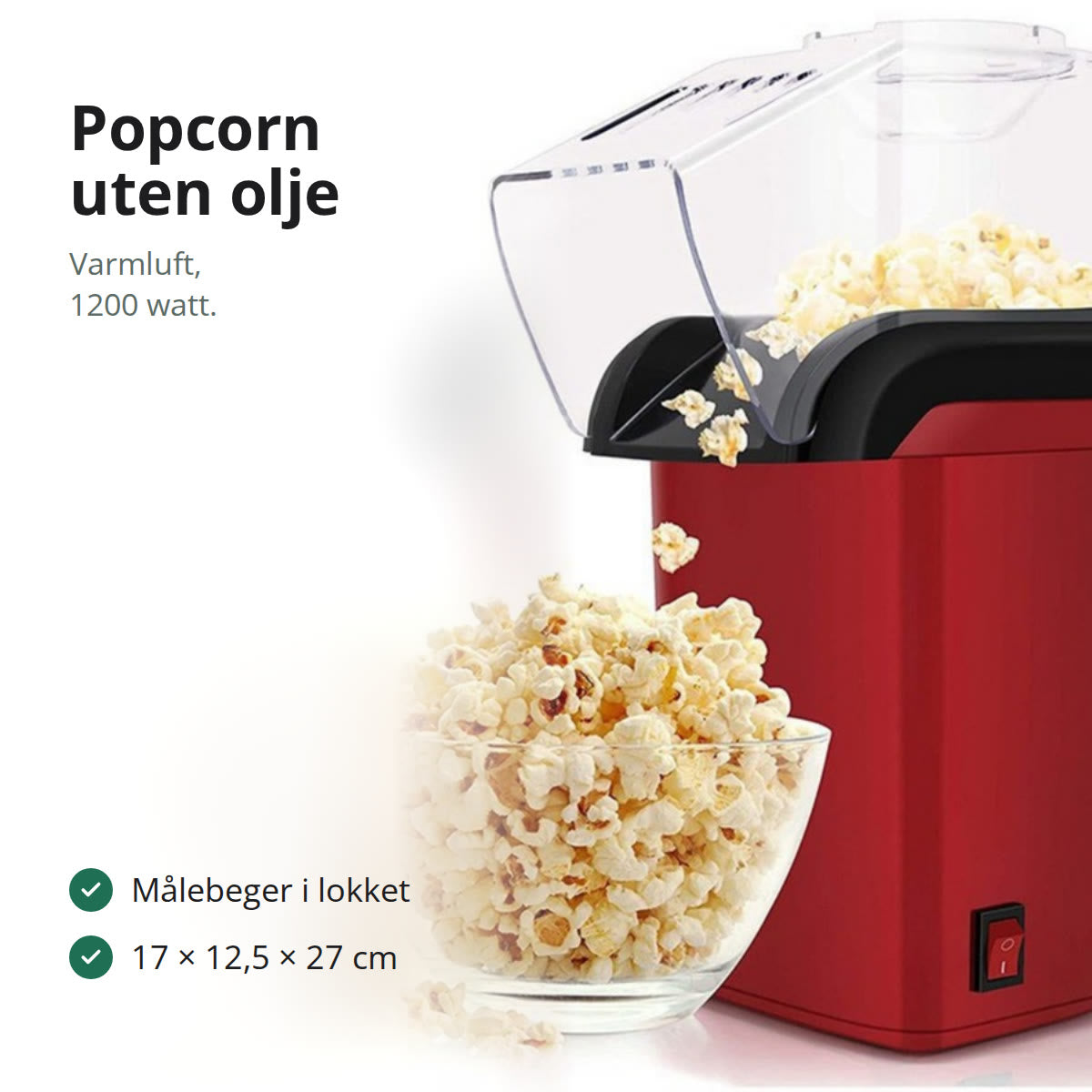 Rød popcornmaskin ved siden av en bolle med ferske popcorn