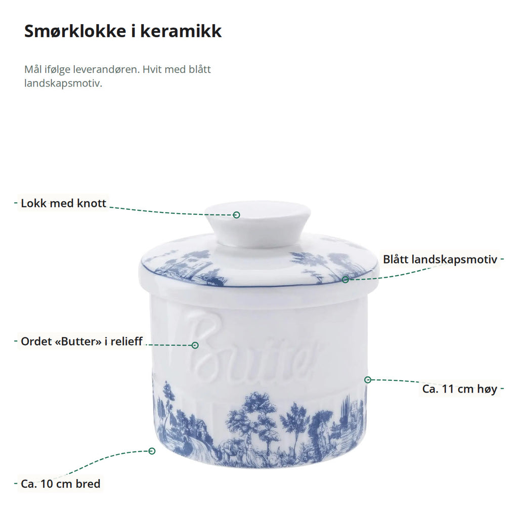 Smørklokken merket med lokk med knott, blått landskapsmotiv, ordet Butter i relieff, bredde ca. 10 cm og høyde ca. 11 cm