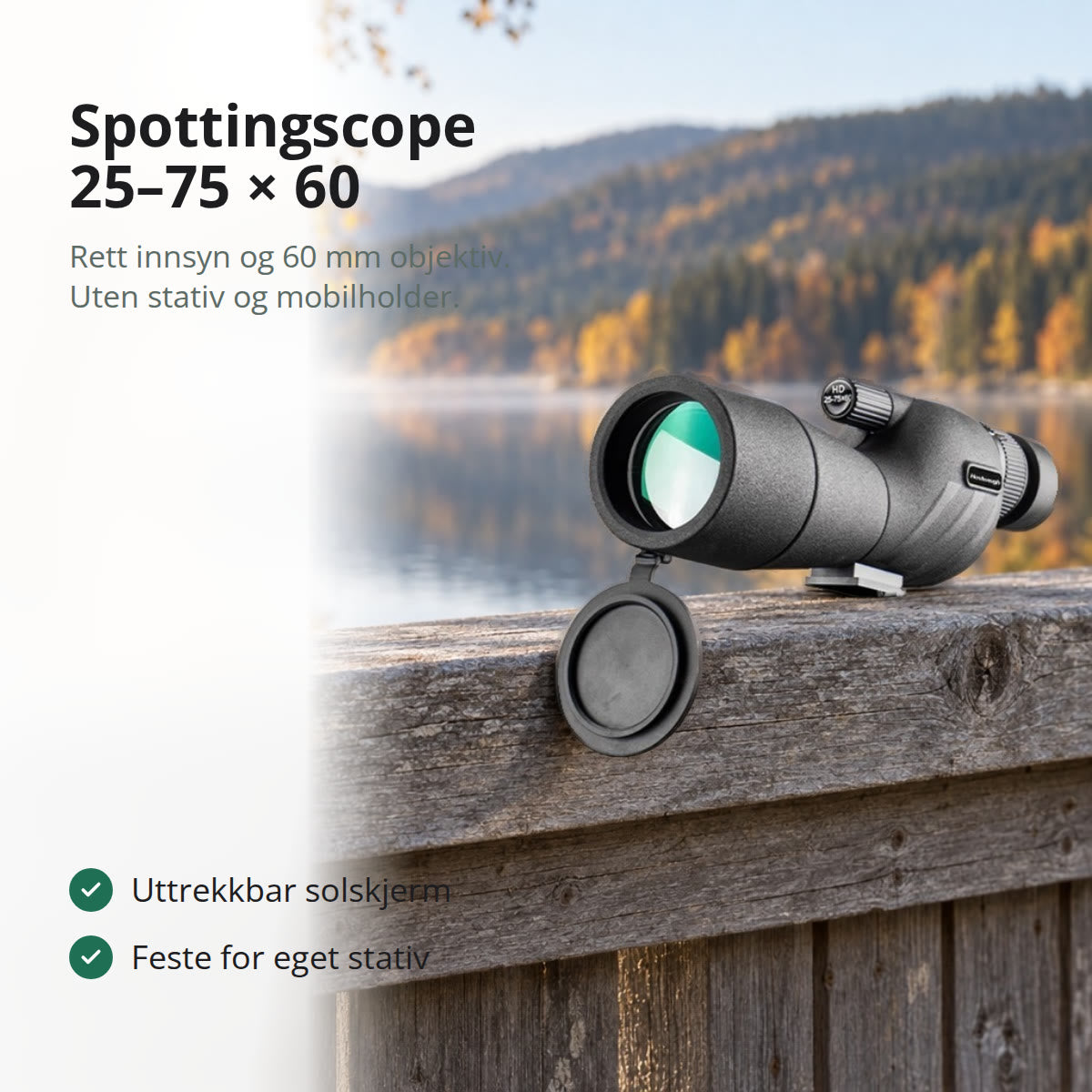Svart spottingscope 25–75 × 60 med hengende objektivdeksel på et gråbleket trerekkverk ved et vann med høstskog