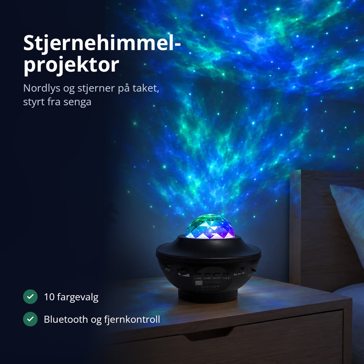 Stjernehimmel-projektor på nattbordet med nordlys og stjerner på taket