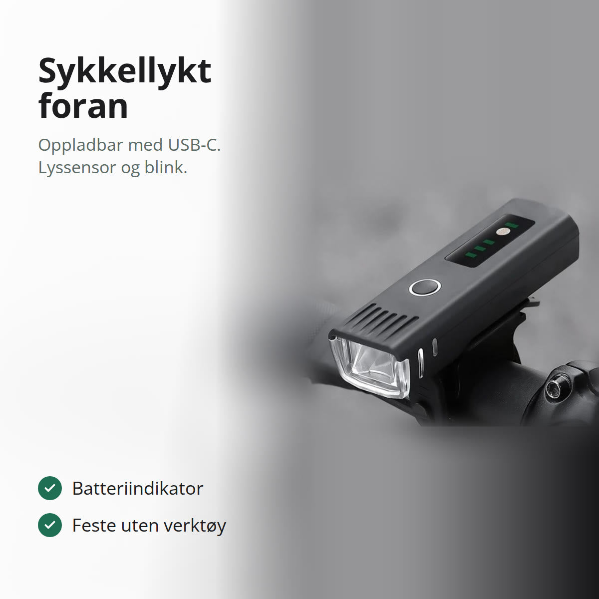 Svart sykkellykt foran montert på styret på en sykkel