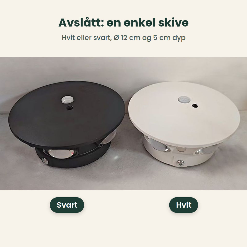 Svart og hvit lampe avslått på et bord, Ø 12 cm og 5 cm dype