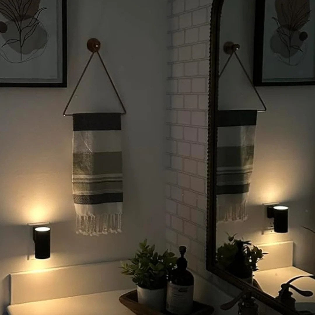 Lampen gir et mykt, varmt lys på badet om kvelden