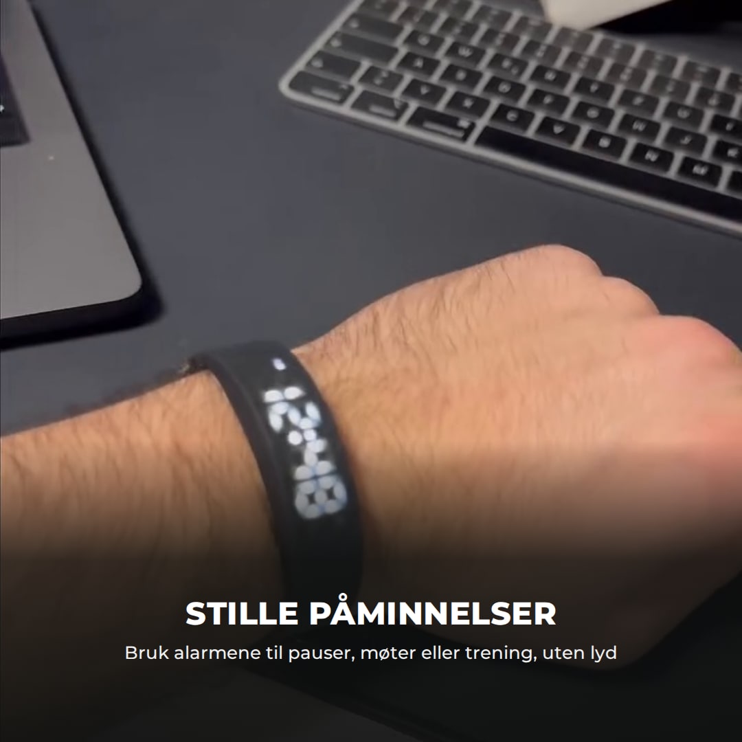 Armbåndet på håndleddet ved skrivebordet: stille påminnelser om dagen