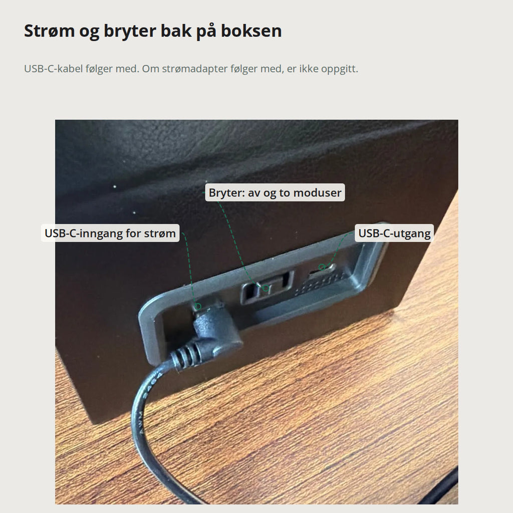 Baksiden av watch winderen med USB-C-inngang for strøm med kabelen satt i, bryter for av og to moduser og USB-C-utgang